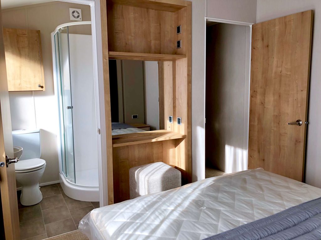 holiday parks uk master bedroom with ensuite toiler and shower