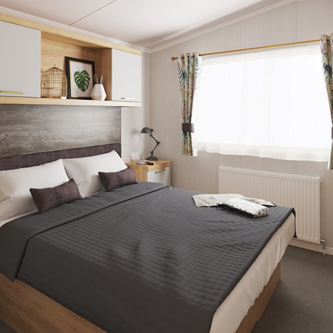 caravans in wales for sale master bedroom with double bed and overhead storage